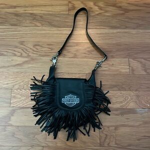 Black Harley-Davidson leather bag.